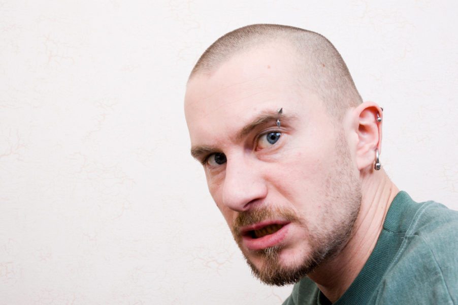 Skinhead at party gets angry over drugs