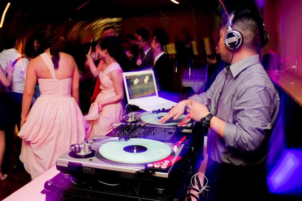 Guy playing tunes at Wedding thinks he's a dj